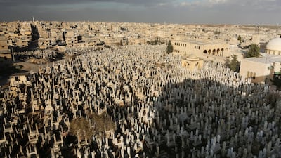 A view of a sprawling cemetery in Maarat Al Numan, some 31km south of Idlib in Syria's north. EPA