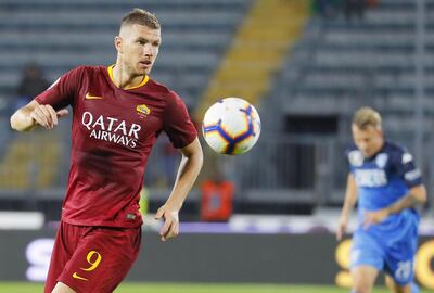 Edin Dzeko will play a key role in Roma's hopes of reaching the Uefa Champions League quarter-finals. EPA