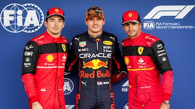 Ferrari driver Charles Leclerc, left, Red Bull's Max Verstappen, centre, and Carlos Sainz of Ferrari after qualifying for the Japanese Grand Prix. EPA
