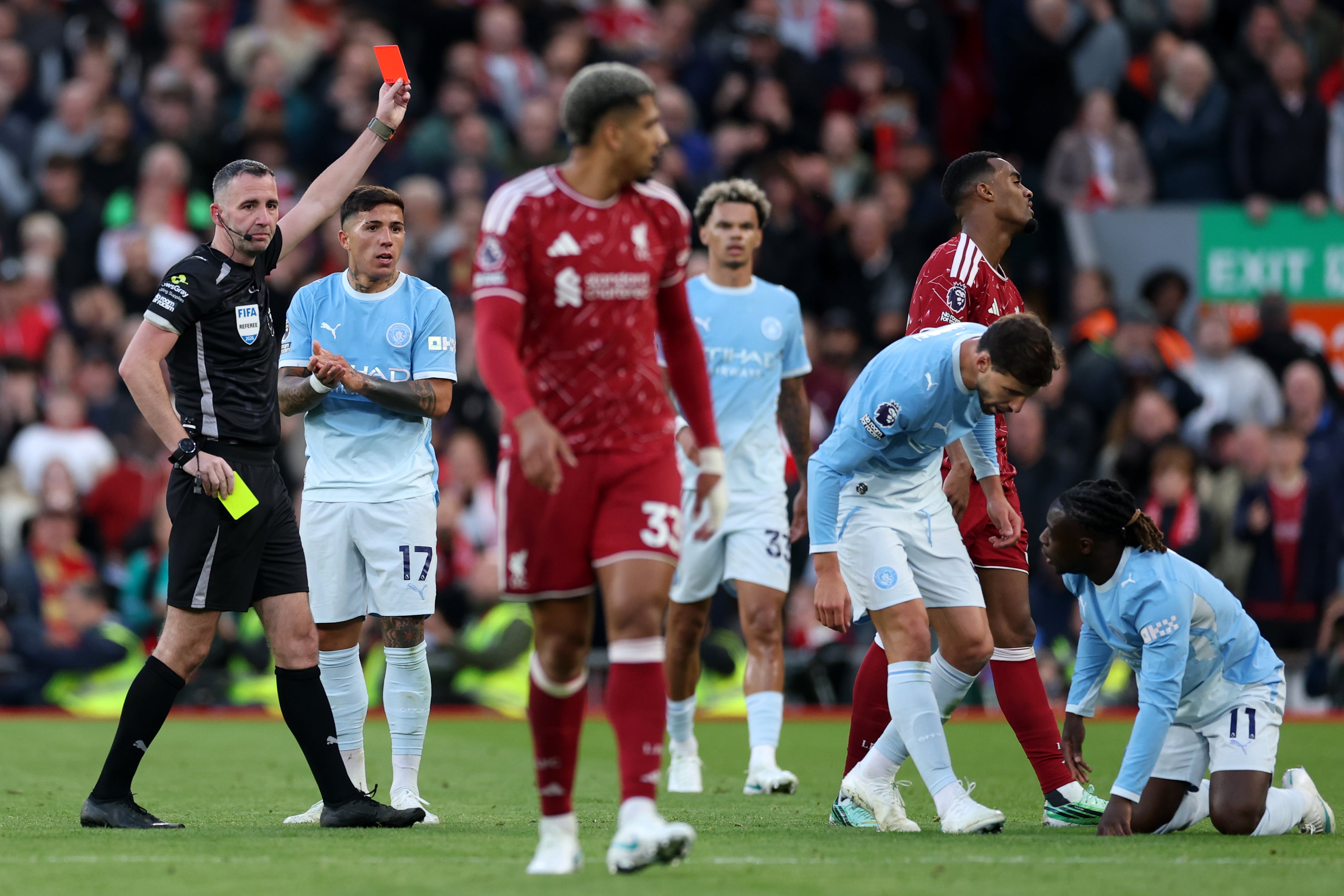 Liverpool's Ryan Gravenberch is shown a red card by referee Chris Kavanagh. Getty Images