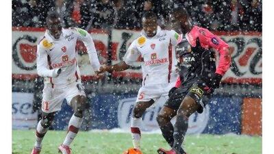 Oscar Ewolo, centre, the Brest captain and defender, is one of seven African players in Alex Dupont's side. Fred Tanneau / AFP