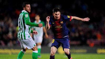 Lionel Messi, right, took just three minutes to score against Real Betis. David Ramos / Getty Images