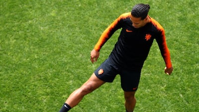 Virgil van Dijk warms up during the Netherlands training session prior to the UEFA Nations League Final. Getty Images