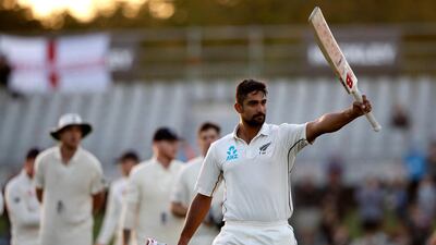 New Zealand's Ish Sodhi waves his bat as he leaves the field at the end of play on the final day of the second Test against England. Mark Baker / AP Photo