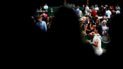 Novak Djokovic hits a shot during his Saturday practice session for Sunday's 2014 Wimbledon men's singles final. Jan Kruger / Getty Images
