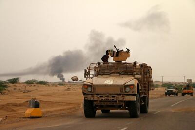 A column of Yemeni government forces and vehicles take position as they fight Houthi rebels in the western port city of Hodeidah, Yemen, 19 June 2018. EPA/NAJEEB ALMAHBOOBI