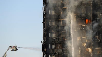 Firefighters tackle the fire in Latimer Road in West London. Toby Melville / Reuters