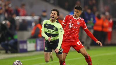 Bernardo Silva of Manchester City goes down after a challenge by Joao Cancelo of Bayern Munich. Getty
