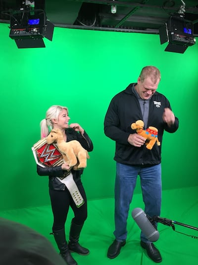 Alexa Bliss, left, and Kane, inside The National's offices in Abu Dhabi. Jason von Berg / The National