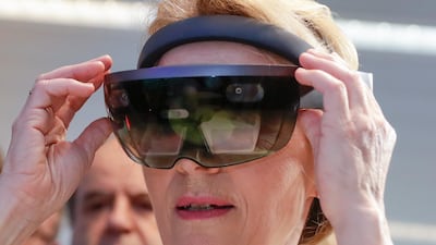 Looking ahead: President of the European Commission Ursula von der Leyen wears AR goggles as she tests the invention 'Sara', a computer-assisted surgery (CAS) device, during a visit at the AI Xperience Center at the VUB (Vrije Universiteit Brussel) in Brussels, Belgium, this week. EPA