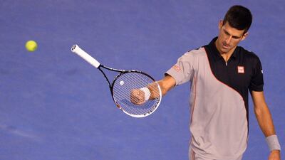 Novak Djokovic was eliminated from the Australian Open in the quarter-final round by Stanislas Wawrinka. William West / AFP