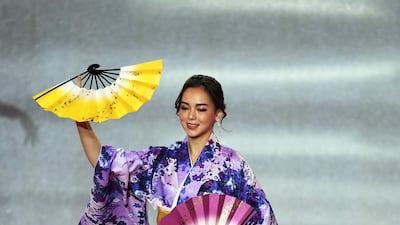 Miss Japan Malika Sera performs during the final in the ExCel centre in London. EPA
