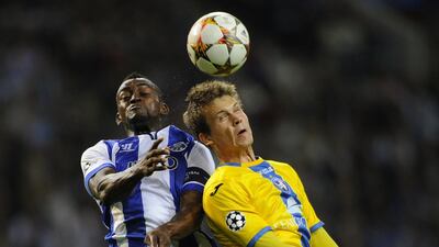 Bate Borisov defender Denis Polyakov, right, vies with FC Porto forward Jackson Martinez during their Champions League match on Wednesday. Miguel Riopa / AFP