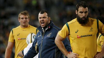 Australia's Wallabies coach Michael Cheika, cdntre, shouts instruction at members of his team before their Bledisloe Cup rugby match against New Zealand's All Blacks in Sydney August 8, 2015. REUTERS/David Gray