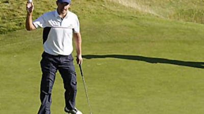 Padraig Harrington celebrates after putting in on the 17th in the Open, his approach shot was named the Shot of the Year.