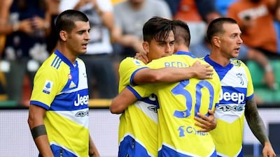 Paulo Dybala of Juventus celebrates after scoring the opening goal. Getty