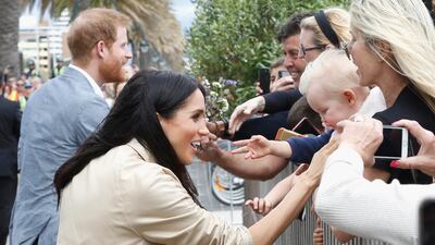 The Duchess of Sussex meets a royal fan and her baby. Getty Images