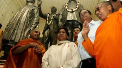 Mayawati, the chief minister Uttar Pradesh, centre, attends a prayer ceremony in New Delhi.