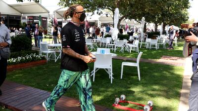 Mercedes driver Lewis Hamilton arrives at the track ahead of the Australian Formula One Grand Prix. AP