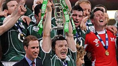 Brian O'Driscoll lifts the Six Nations trophy to cap a memorable year of success for the Ireland captain.