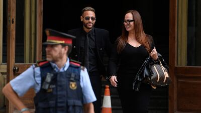 Neymar leaves after attending the opening audience at the courthouse in Barcelona. AFP