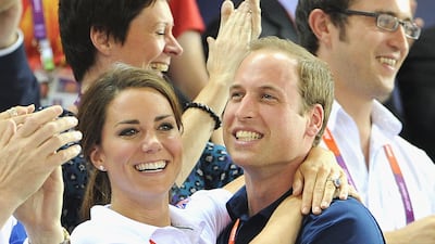 Catherine and Prince William celebrate after watching cyclists Philip Hindes, Jason Kenny and Sir Chris Hoy of Great Britain win the gold and set a world record during the London 2012 Olympic Games