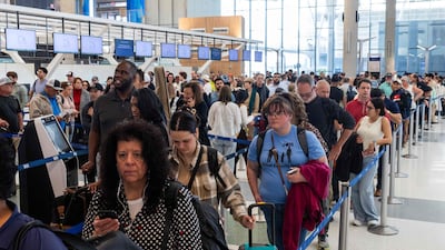 Queues of travellers waiting at George Bush Intercontinental Airport in Houston, Texas. Getty Images / AFP