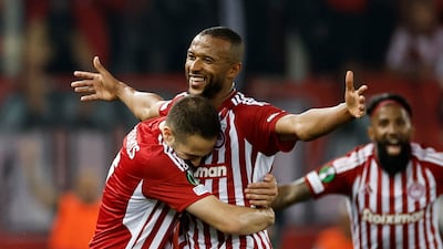 Olympiakos striker Ayoub El Kaabi celebrates with Kostas Fortounis after scoring his second goal in the Europa Conference League semi-final second leg victory against Aston Villa. Reuters