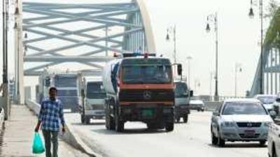 Lorries cross the Maqta Bridge on to Abu Dhabi island on Tuesday.