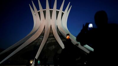 Rubber workers and indigenous people from the Amazon attend a protest in favour of the environment and against the destruction of the Amazon forest in front of the Cathedral of Brasilia in Brasilia, Brazil. Reuters