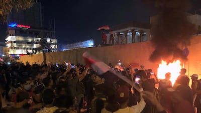 Demonstrators set fire in front of the Iranian consulate, as they gather during ongoing anti-government protests in Kerbala, Iraq November 3, 2019. Reuters
