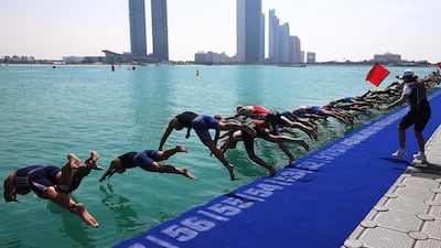 Men start swimming in Elite Men’s 2016 ITU World Triathlon yesterday on Abu Dhabi Sailing and Yacht Club on Breakwaters. Ravindranath K / The National