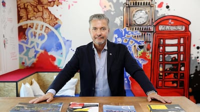 John Martin St Valery says he and his wife went through some 'very tough times' financially when their children were young. Chris Whiteoak / The National