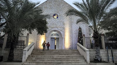 Children leave The Holy Family Church.