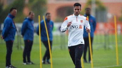 Robin van Persie trains with the Netherlands national football team on Tuesday as the side prepare for the 2014 World Cup. Francisco Leong / AFP / May 20, 2014