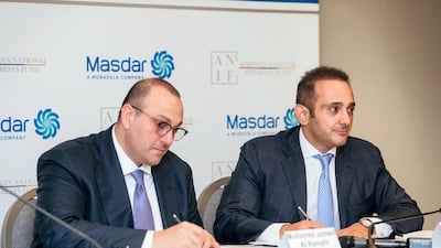 Mohamed Jameel Al Ramahi, chief executive of Masdar, and David Papazian, chief executive of the Armenian National Interests Fund (ANIF), sign a preliminary agreement to explore collaboration in renewable energy. Courtesy Masdar