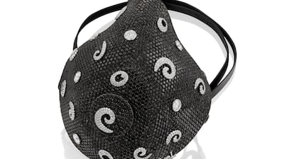 Set with 210 carats of white and black diamonds, Yvel has created the worlds most expensive face mask. Courtesy Yvel