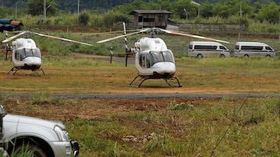 Helicopters are on standby, ready to transport the schoolboys and their soccer coach. Reuters