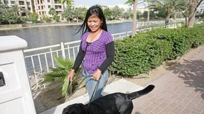 Social networking sites are becoming more useful for finding local people to help with chores such as walking the dog. Randi Sokoloff / The National