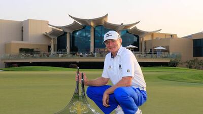 Chris Williams poses with the Sharjah Senior Masters trophy. Courtesy Sharjah Senior Masters