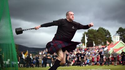 A competitor takes part in the hammer throwing event at the annual Braemar Gathering in Scotland. Andy Buchanan / AFP