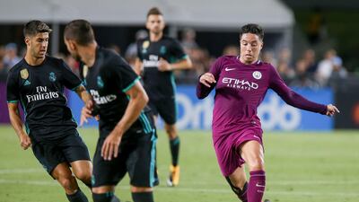 Manchester City's Samir Nasri, right, will swap his Manchester City shirt for that of Antalyaspor. Ringo Chiu / AFP
