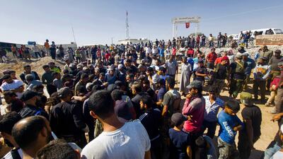 Mourners at the funeral and burial of fighters from the Hamza Division Syrian rebel group who were killed in the air raids. AFP