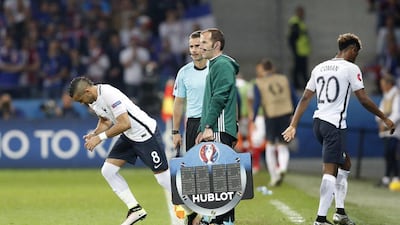 Dimitri Payet takes the place of Kingsley Coman for France. Carl Recine / Reuters