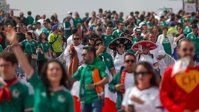 Fans arrive before the opening match. EPA