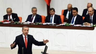 Turkey's president Recep Tayyip Erdogan addresses the Turkish parliament on October 1, 2014. Adem Altan/AFP Photo