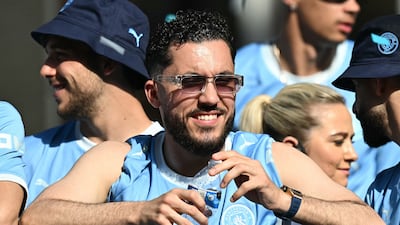 Manchester City's Rayan Cherki during the open-top bus parade. AFP