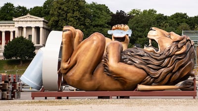 A sculpture of a lion waits to be erected and installed at a tent construction for the upcoming Oktoberfest on the Theresienwiese fair ground in Munich, Germany. EPA