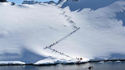 Tourists visit Orne Harbur in South Shetland Islands, Antarctica. AFP