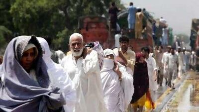 Villagers flee their homes in Nowshera as Pakistan's government appeals to expatriates for aid donations.